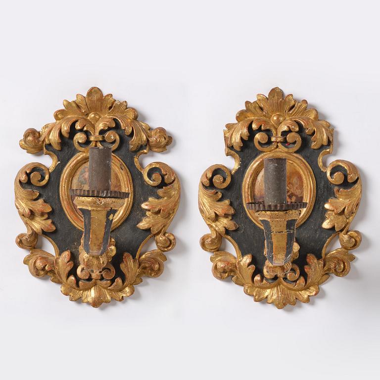 Wall sconces, a pair for one candle, Italy, 19th century, Baroque style.