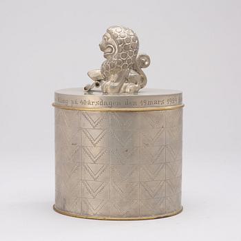An Anna Petrus pewter and brass lidded jar, Svenskt Tenn, Stockholm 1928.