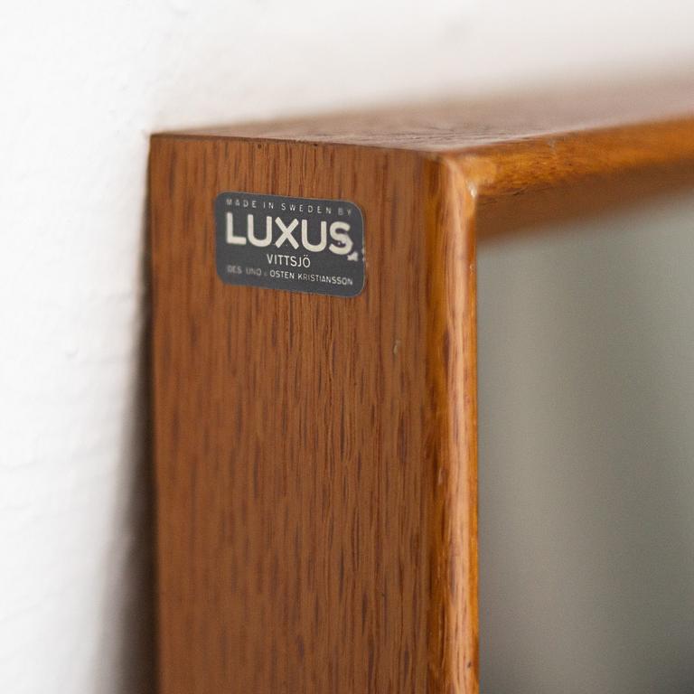 An oak mirror by Uno & Östen Kristiansson for Luxus, Vittsjö.