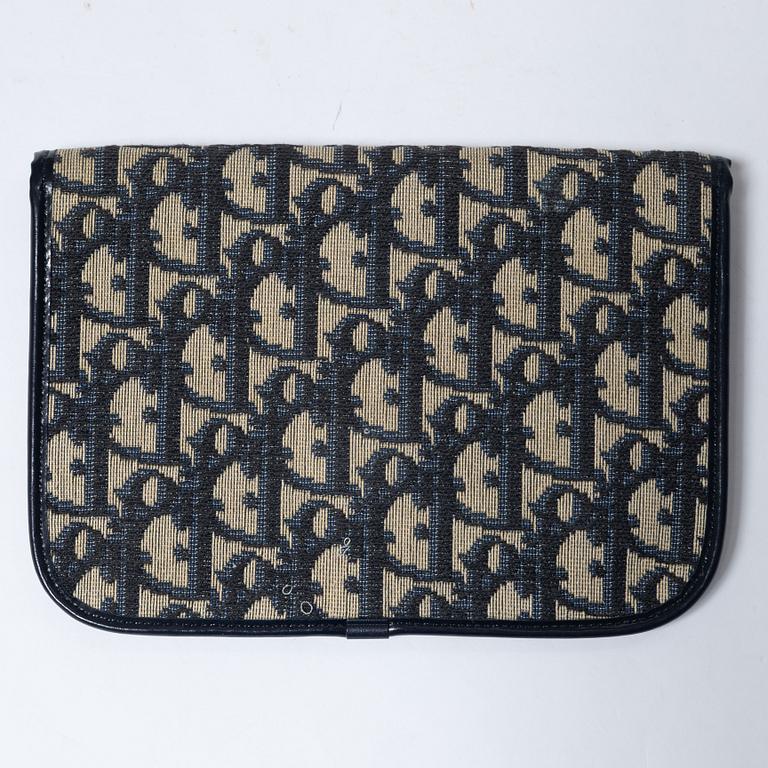 Christian Dior, a clutch and a scarf.
