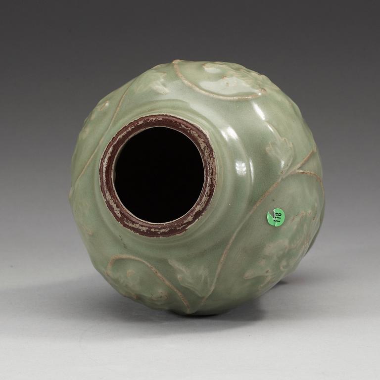 A celadon glazed vase and dish, Yuan/Ming dynasty.