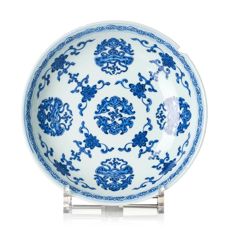 A blue and white deep dish, Qing dynasty with a Qianlong seal mark.