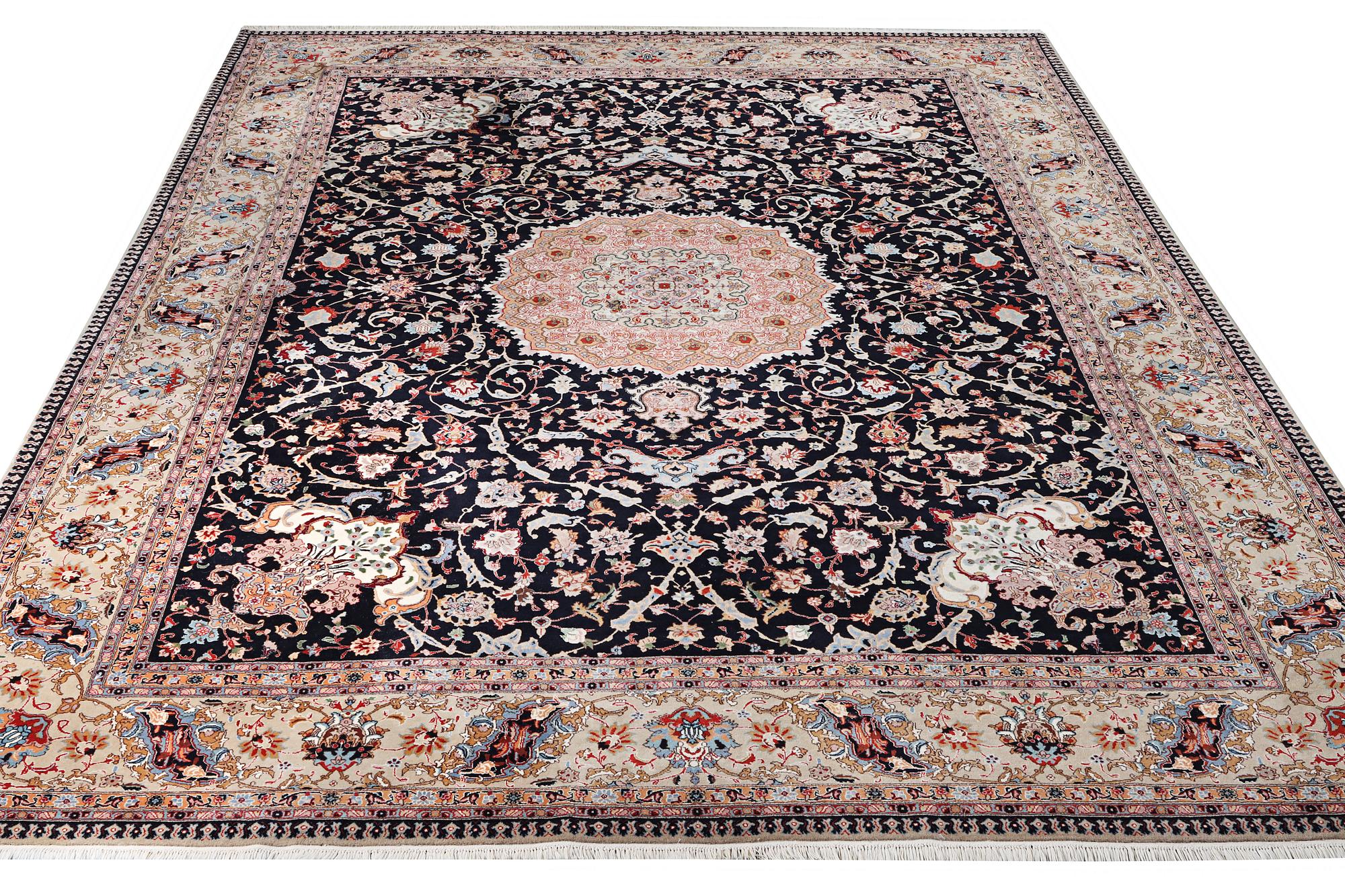 A semi.antique Tabriz carpet, 50 raj, c. 390 x 290 cm.