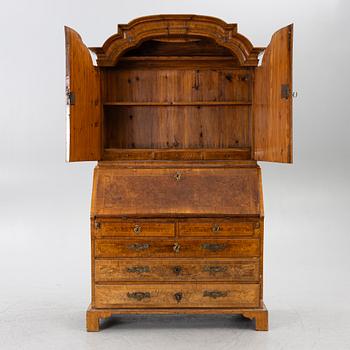 A Swedish rococo burr-alder veneered cabinet, later part 18th century.