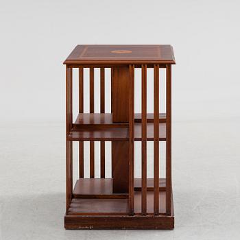 A mahogany veneered revolving bookcase, late 20th Century.