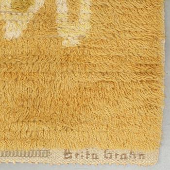 Brita Grahn, A CARPET, knotted pile, ca 429 x 201 cm, signed H & M Brita Grahn as well as SKOKLOSTER 1949.