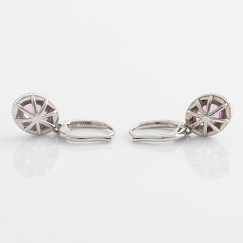 Earrings with pink sapphires and brilliant-cut diamonds.