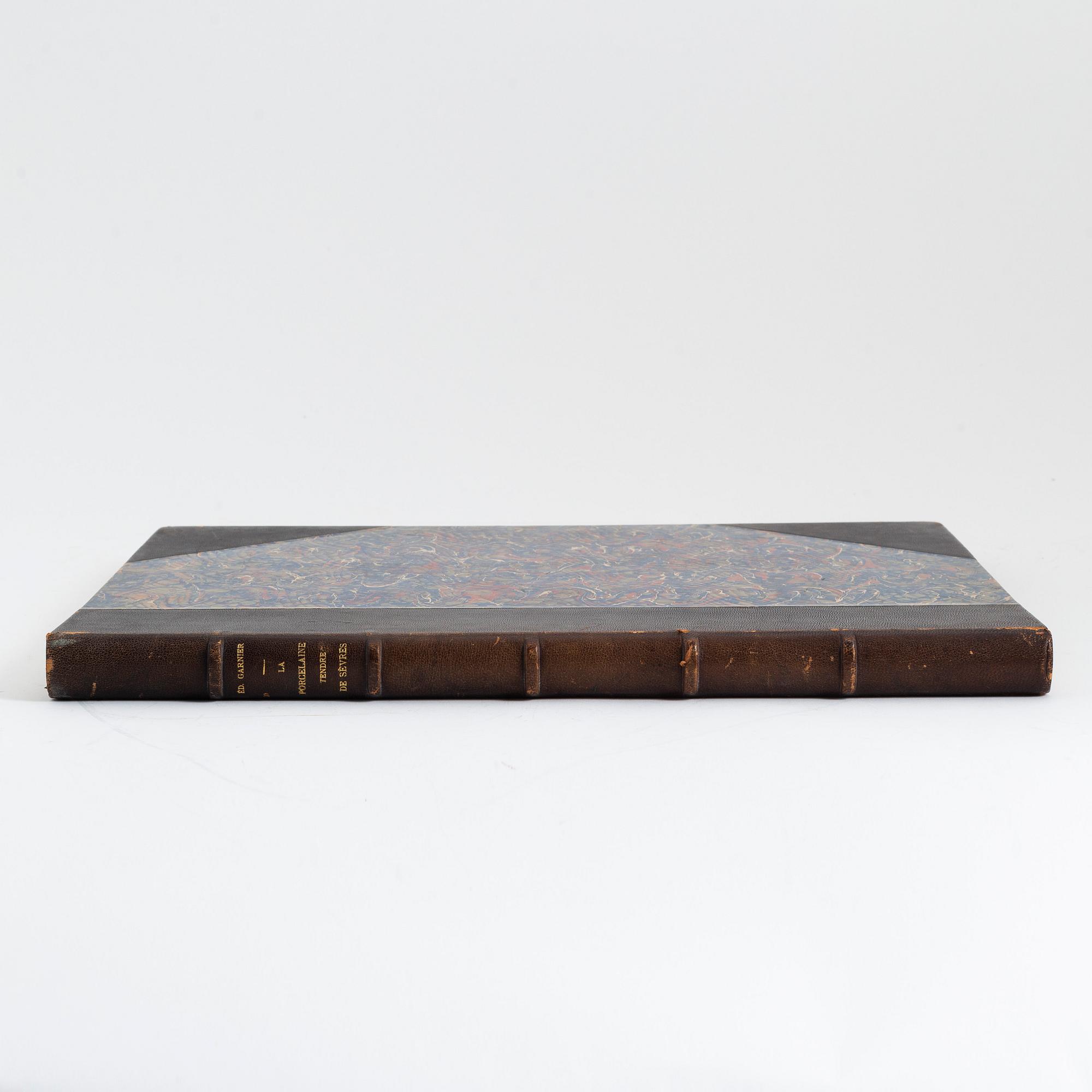 A book, La Porcelaine Tendre, de Sevres, par Edouard Garnier. 50 Planches reproduisant 250 motifs en aqurelle. Paris.