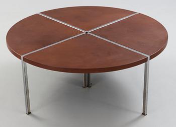 A Walter Knoll dining table with brown leather top, Germany.
