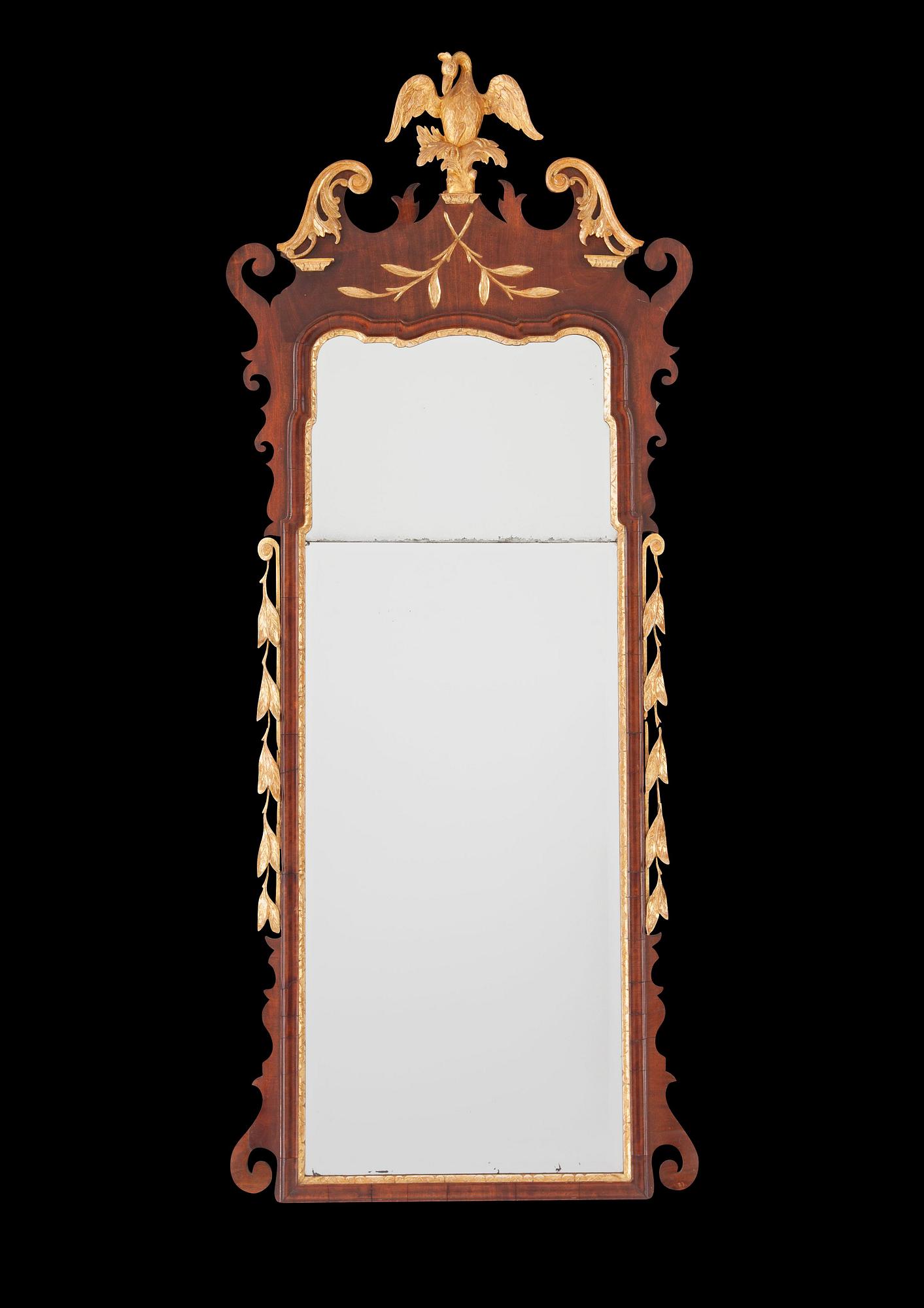 An English late Baroque mid 18th century mirror.