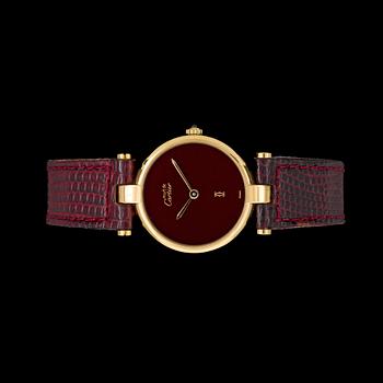 689. A watch by Cartier.