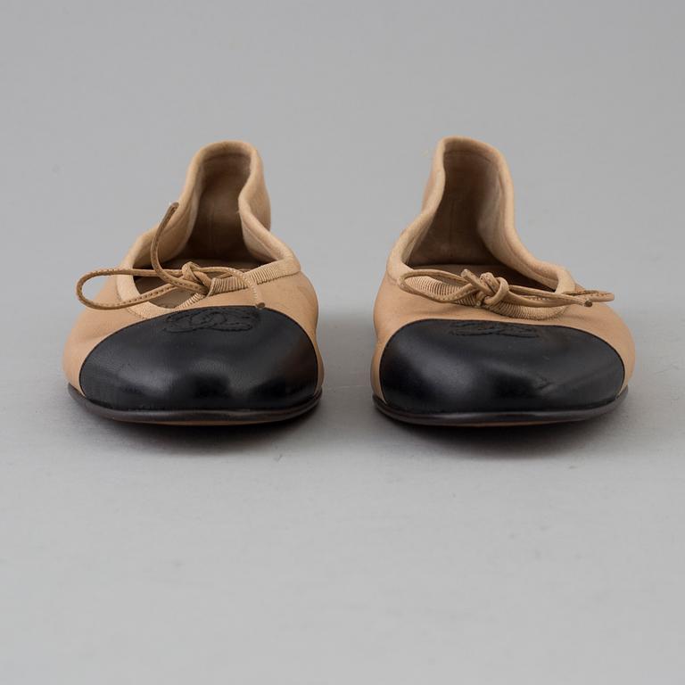 Ballerina shoes by Chanel.