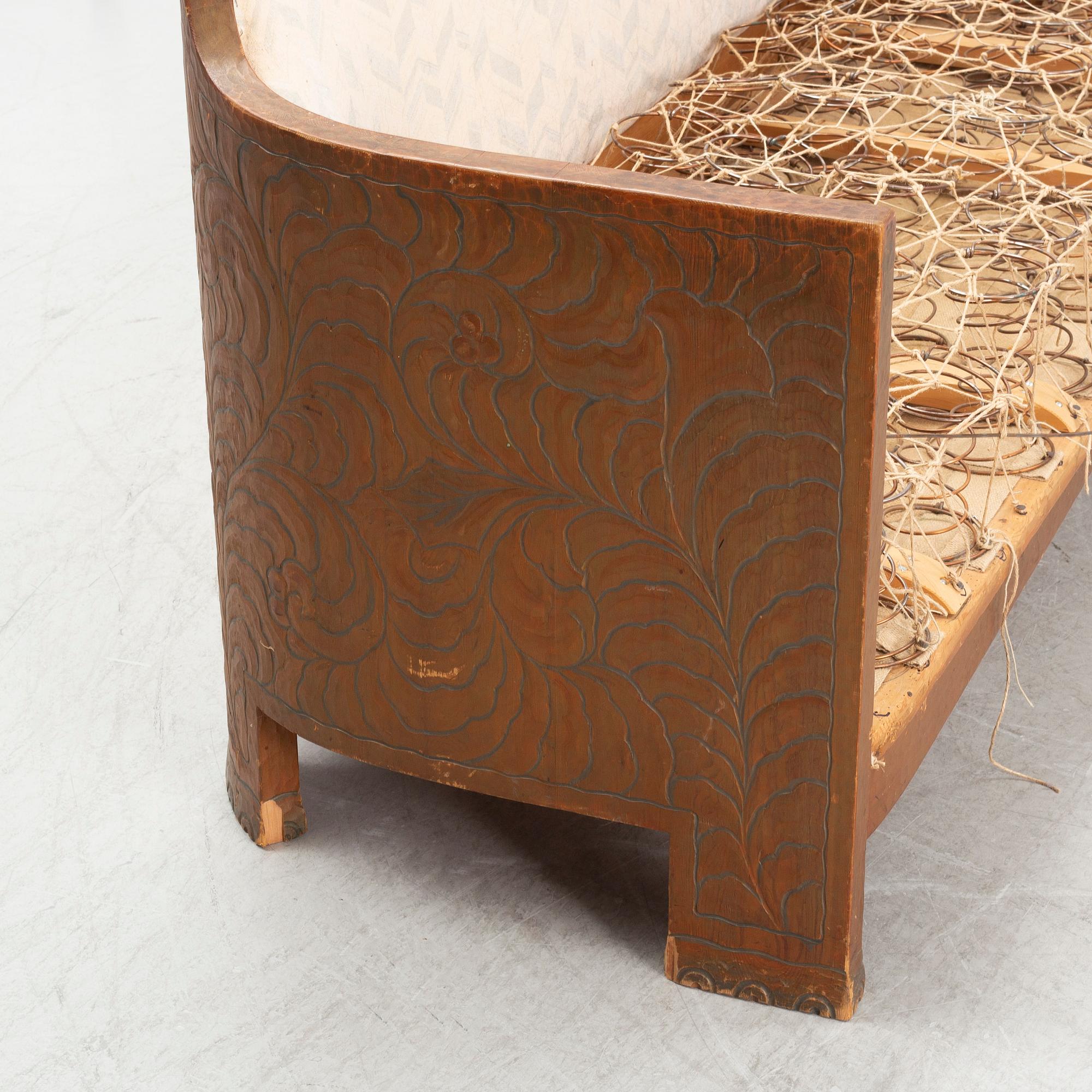 Otto Wretling, attributed to, an Art Nouveau pine sofa, Sweden early 20thC.