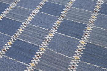 Barbro Nilsson, a carpet, 'Salerno blå med enkel bård', flat weave, c. 365 x 244 cm, signed AB MMF BN.
