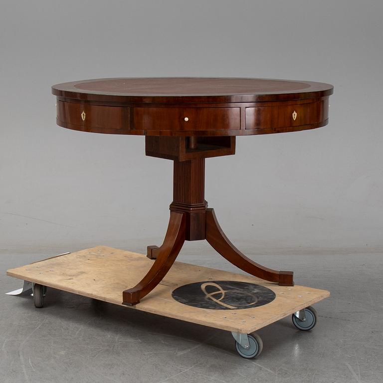 A revolving table, mid 19th century.