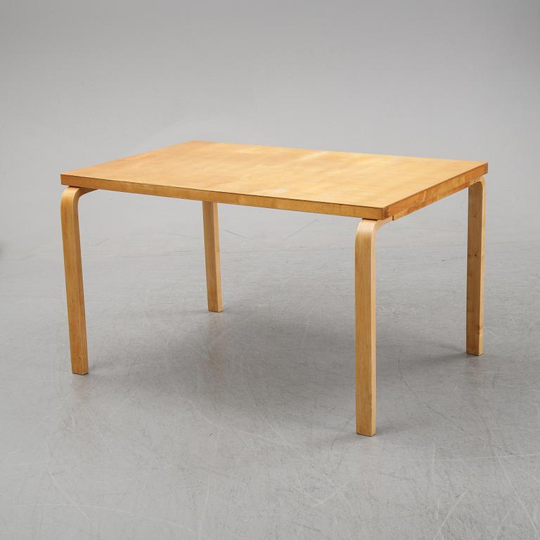 Alvar Aalto, a birch dining table, Artek, Finland, mid 20th Century.