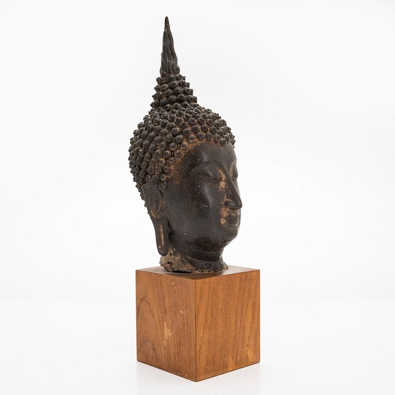 A patinated metal sculpture from Thailand, 20th century.