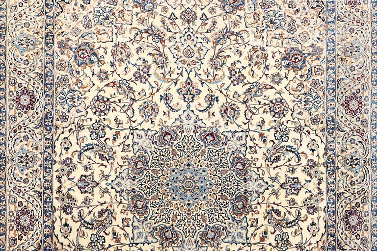 A Nain, part silk carpet, c. 474 x 322 cm.
