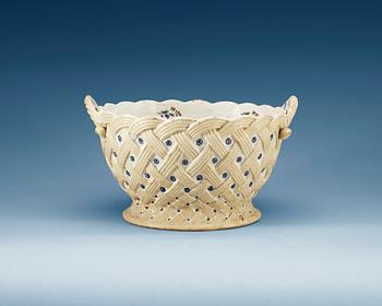 729. A large faience basket, presumably French, 18th Century.