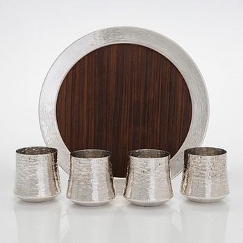 Tapio Wirkkala, four silver beakers, and a rosewood and sterling silver tray, Kultakeskus, Hämeenlinna 1973-74.