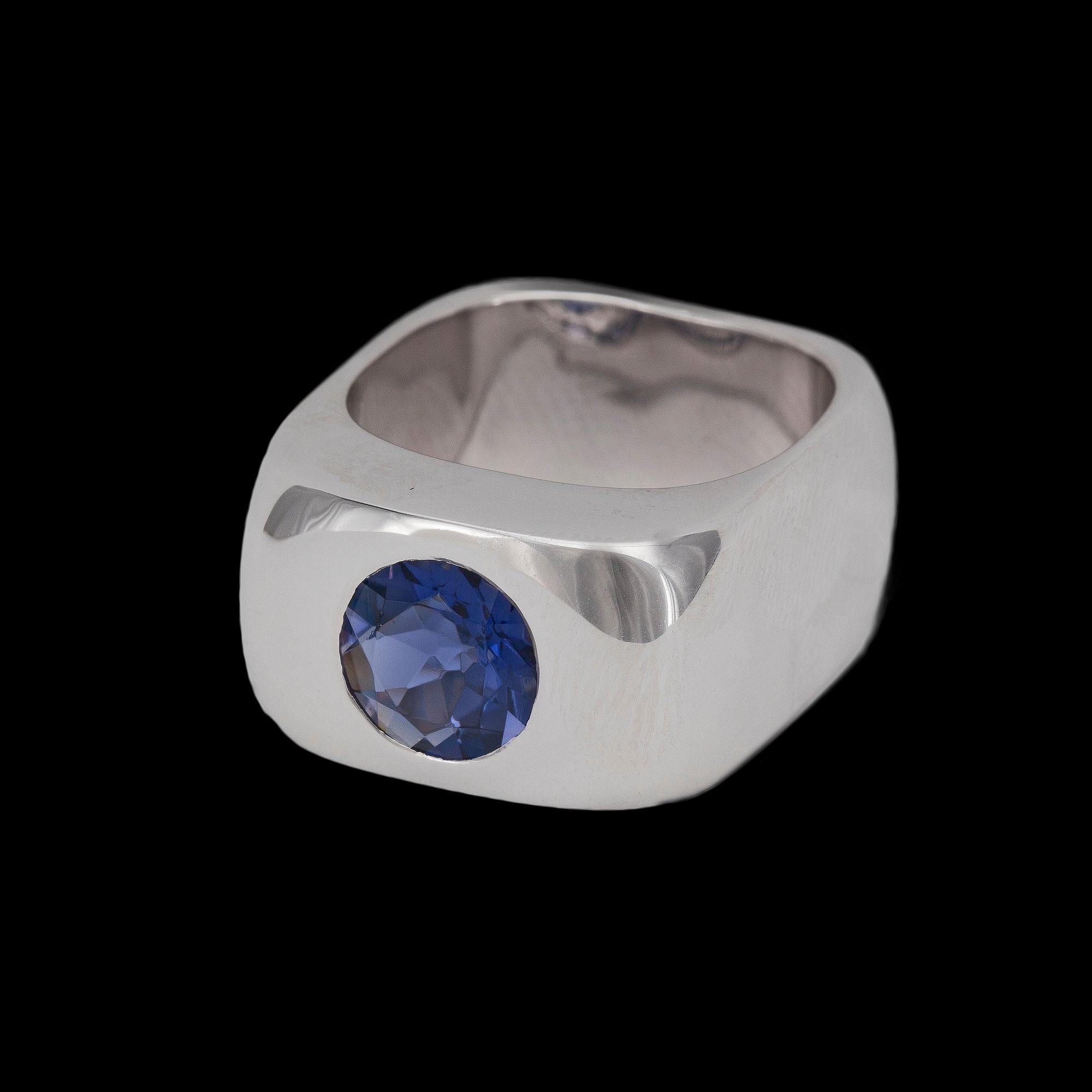 A white gold and tanzanite ring.