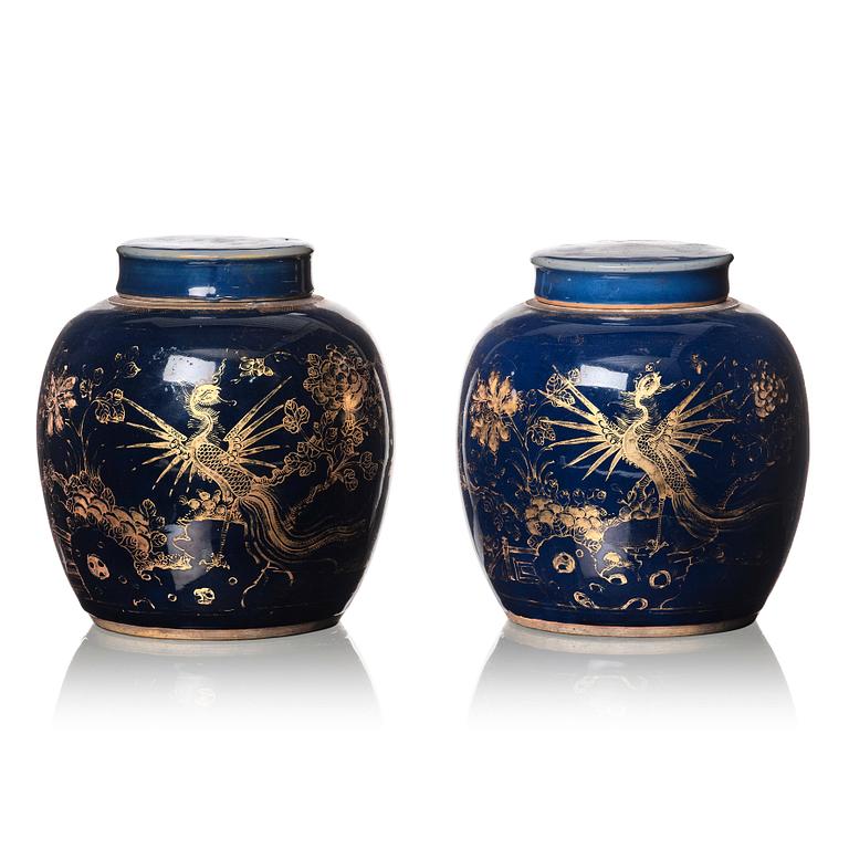 A pair of blue glazed Chinese jars with covers, Qing dynasty, Qianlong (1736-95).