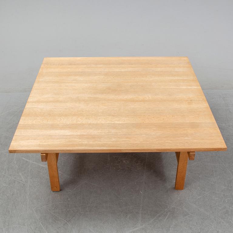 An oak coffee table by Hans J Wegner for Andreas Tuck, Denmark.