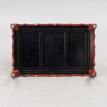 A Chinese table, circa 1920.