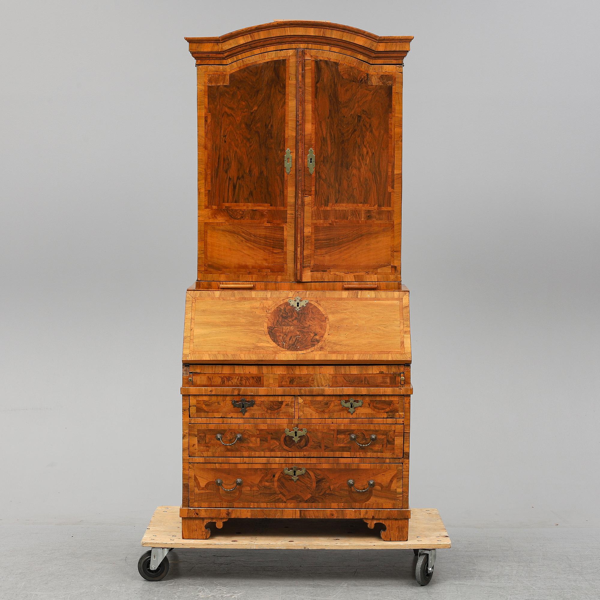 A veneered, barocque  writing cupbord.
