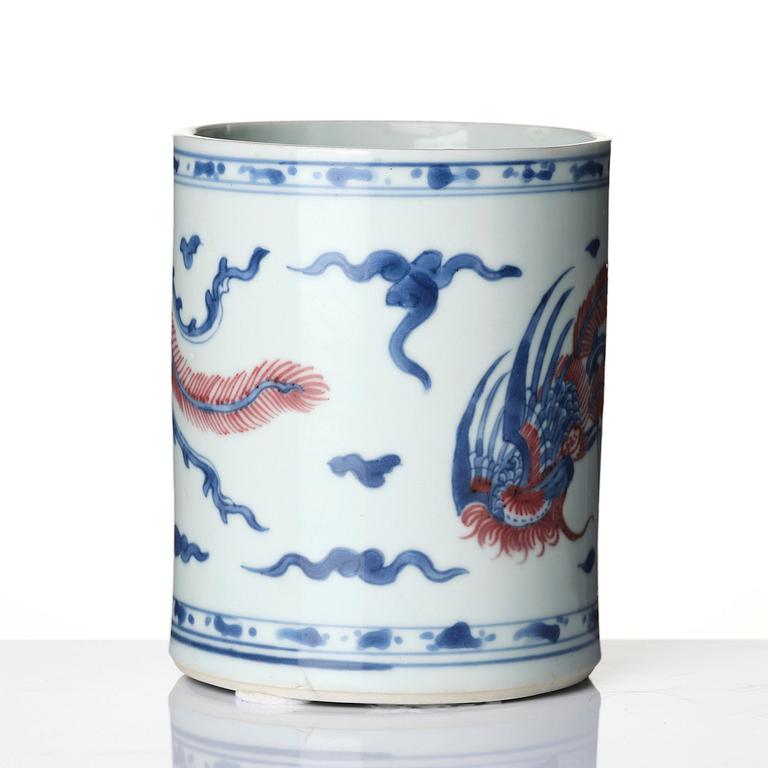 A blue and white and underglaze red 'phoenix' brushpot, Bitong, Qing dynasty, Kangxi (1662-1722).