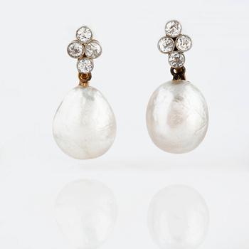 A pair of natural drop shaped saltwater pearl and old-cut diamond earrings.