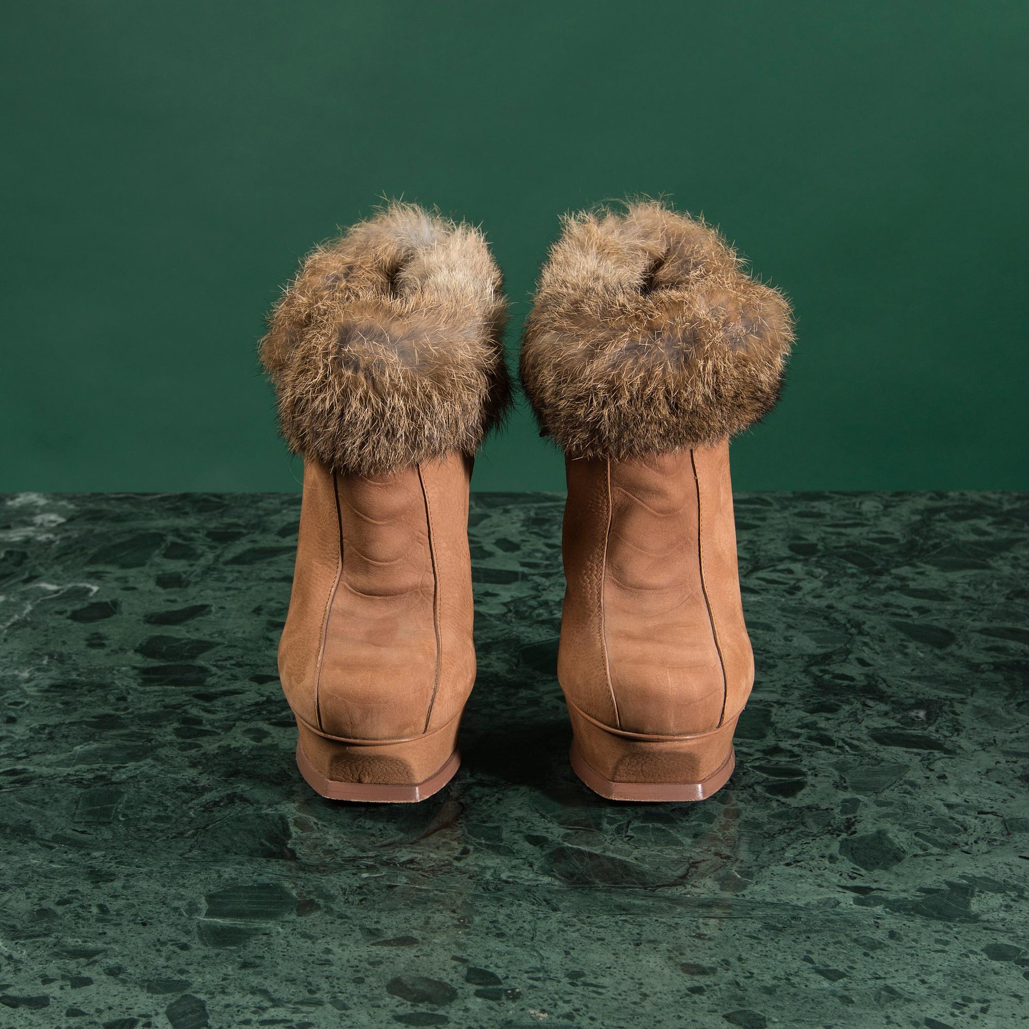 A pair of boots by YVES SAINT LAURENT,in size 37.