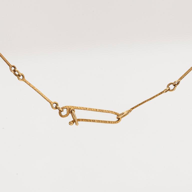 Björn Weckström, An 18K gold necklace 'Thai' with an 8/8-cut diamond ca. 0.02 ct. Lapponia 1978.