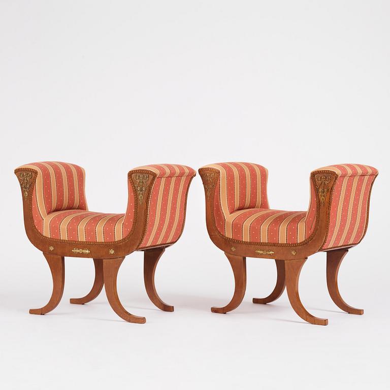A pair of Swedish Royal Empire stools.