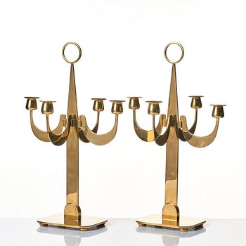 Josef Frank, a pair of brass candelabra by Svenskt Tenn, Sweden 1950's, model nr 2663.