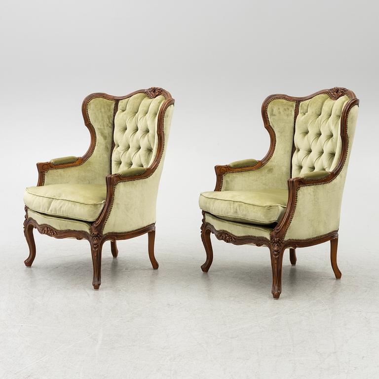 A pair of bergère armchairs, rococo-style, first half of te 20th century.
