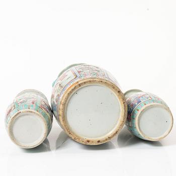 A group of three famille rose vases, Qing dynasty, late 19th century.