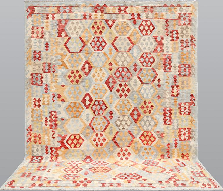 A kilim carpet, ca 340 x 259 cm.