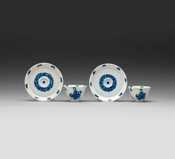 A pair of blue and white cups and saucers, Qing dynasty Kangxi (1662-1722), mark and period.