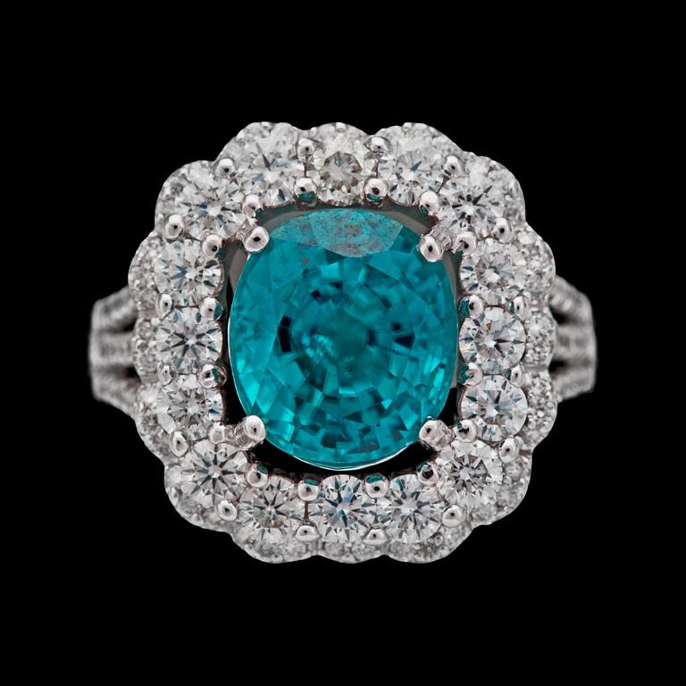 A blue zircon, 6.30 cts, and brilliant cut diamonds, tot. 1.7 5 cts.