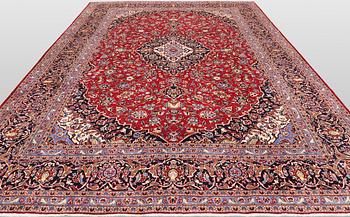 A Keshan carpet, 390 x 297 cm.
