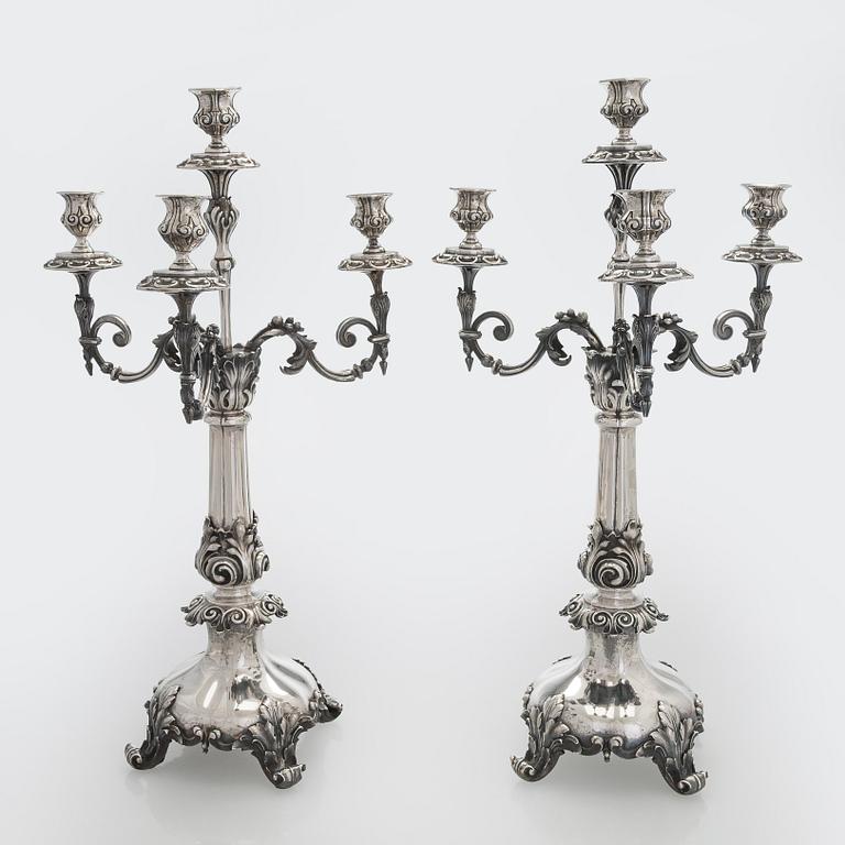 A pair of silver candelabra, maker marks of Carl Johan Tegelsten, Saint Petersburg 1850.