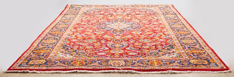 A carpet from Golpaigan. Circa 295 x 200 cm.