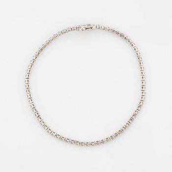Brilliant-cut diamond tennis bracelet, with report W.G.I.