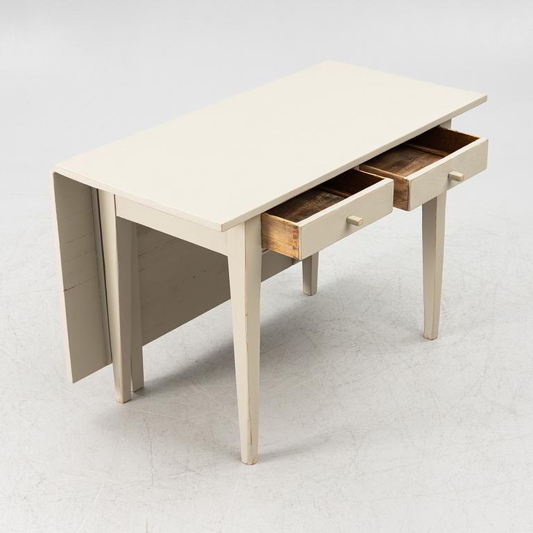 A drop-leaf table, late 19th century.