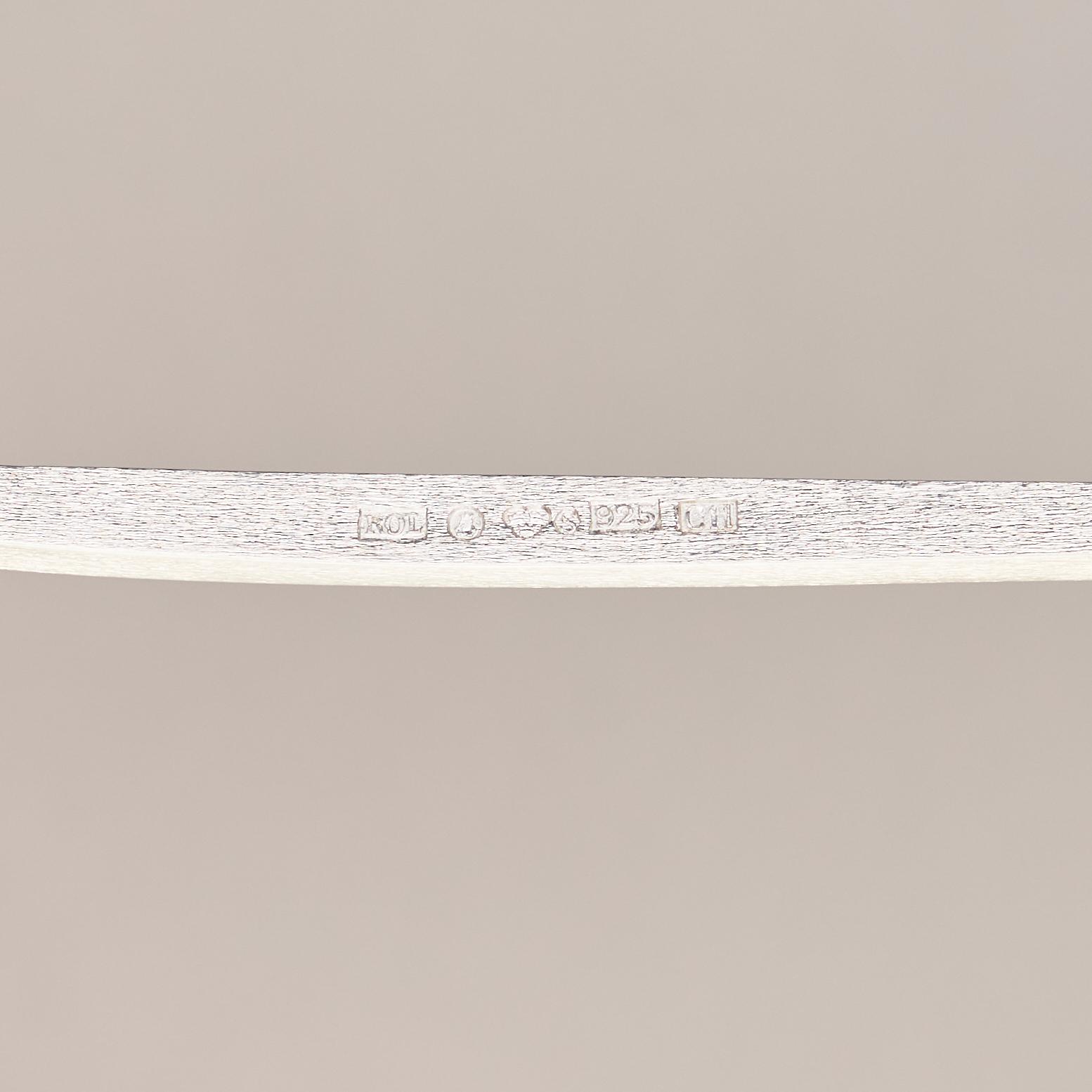 A parcel-gilt silver sterling spoon, mark of Rolf Lindståhl, Stockholm 2001.
