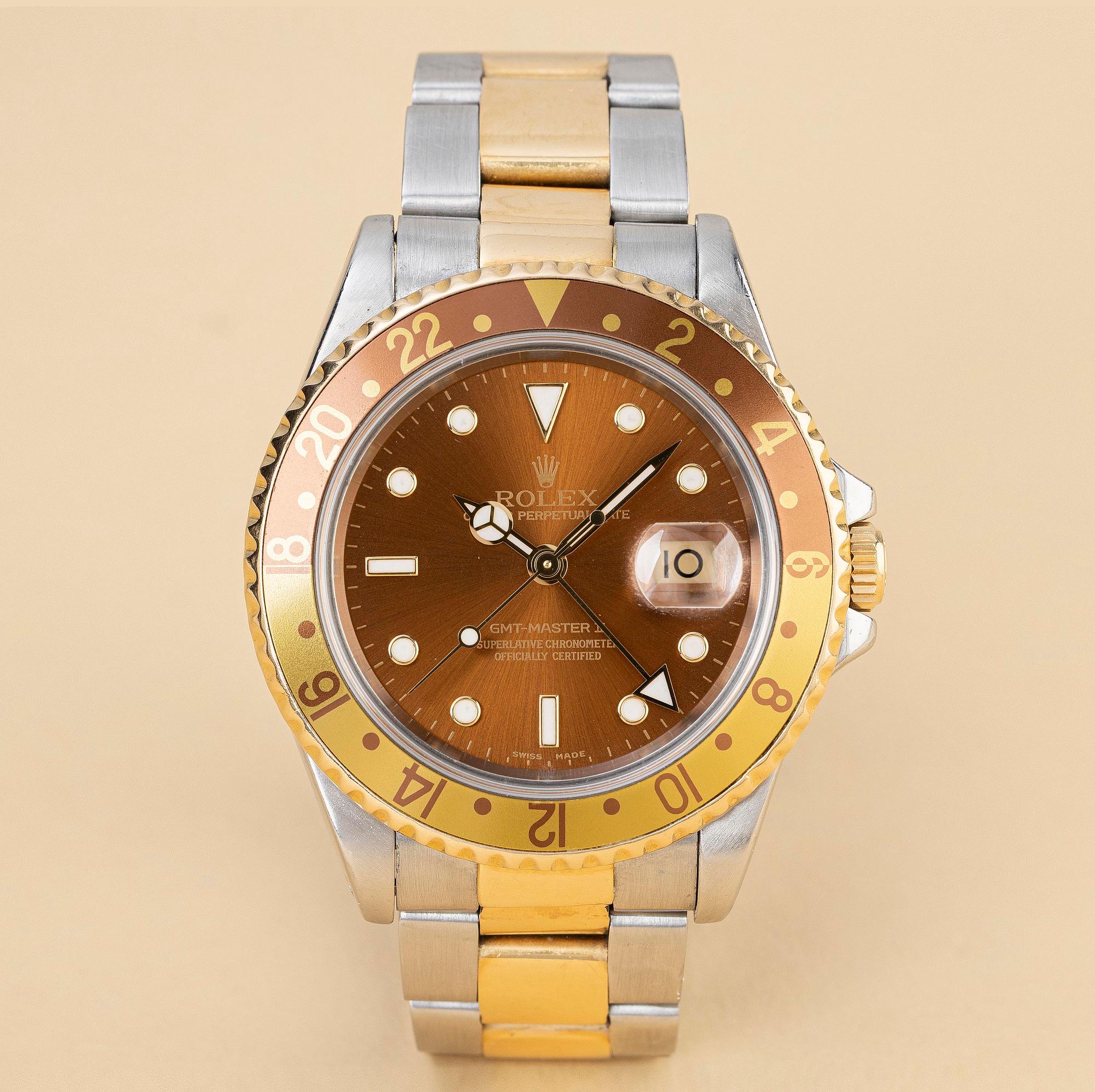 Rolex, GMT-Master II, "Root Beer" & "Black Tritium Dial & Insert", ca 1995.