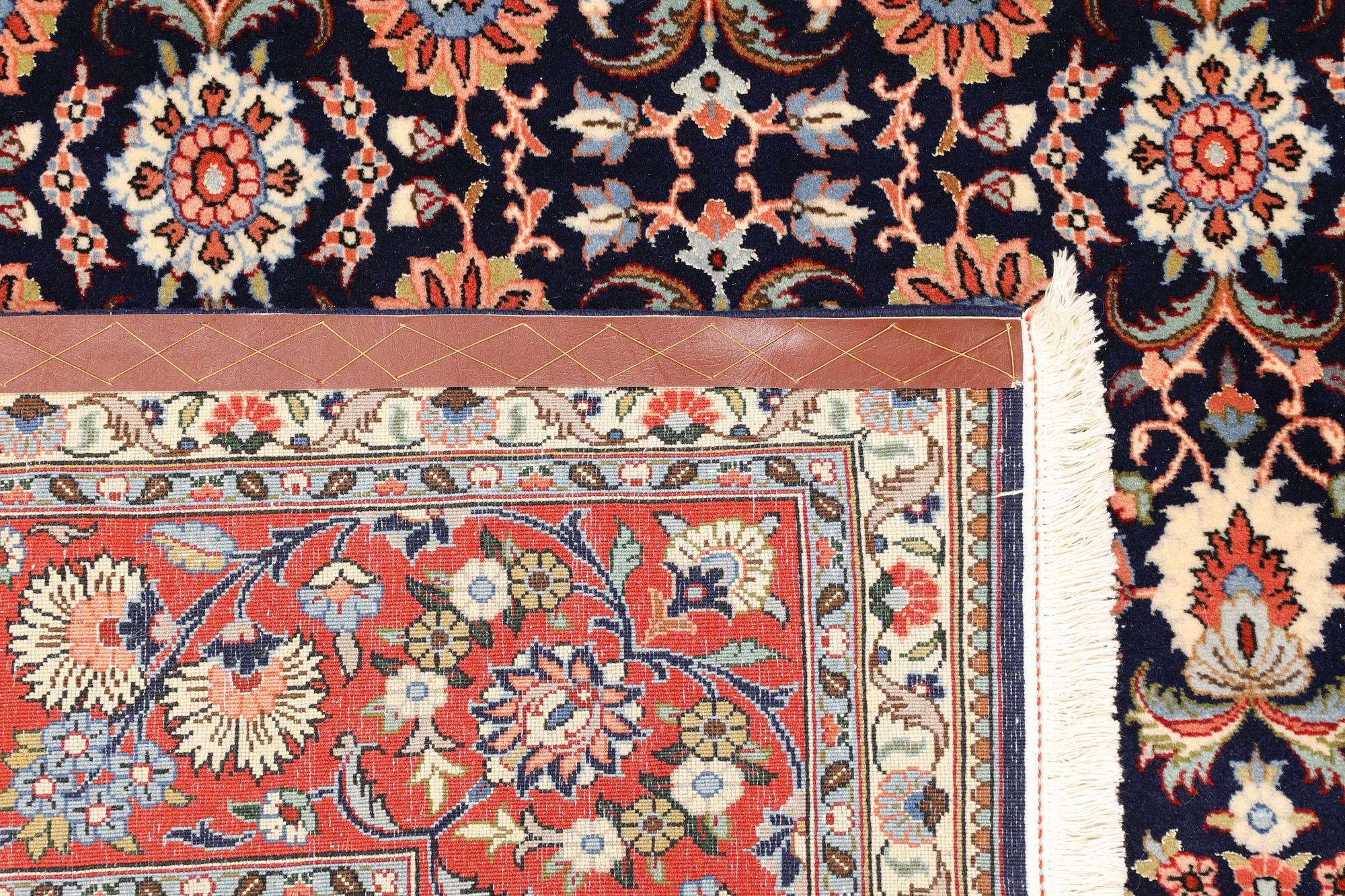 A part silk Sarouk rug, signed, approx. 240 x 208 cm.