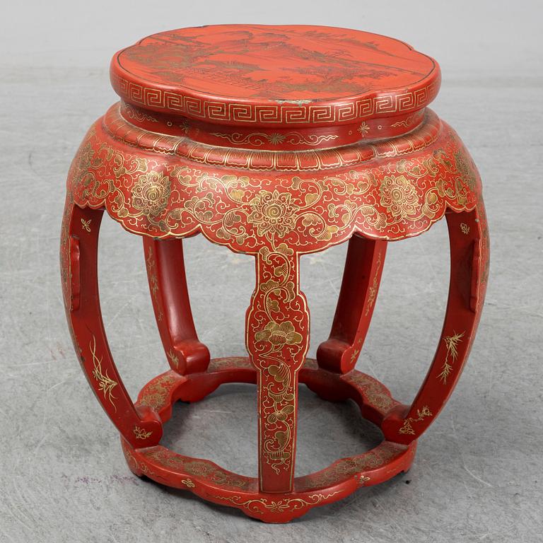 A Chinese red lacquered stool, early 20th century.