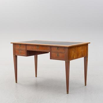 A circa 1900 late Gustavian mahogany veneered desk.